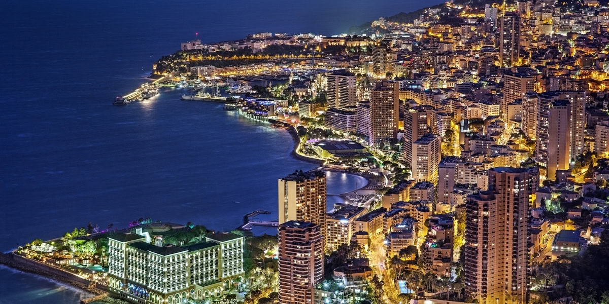 Monte Carlo Casino square with luxury sedan