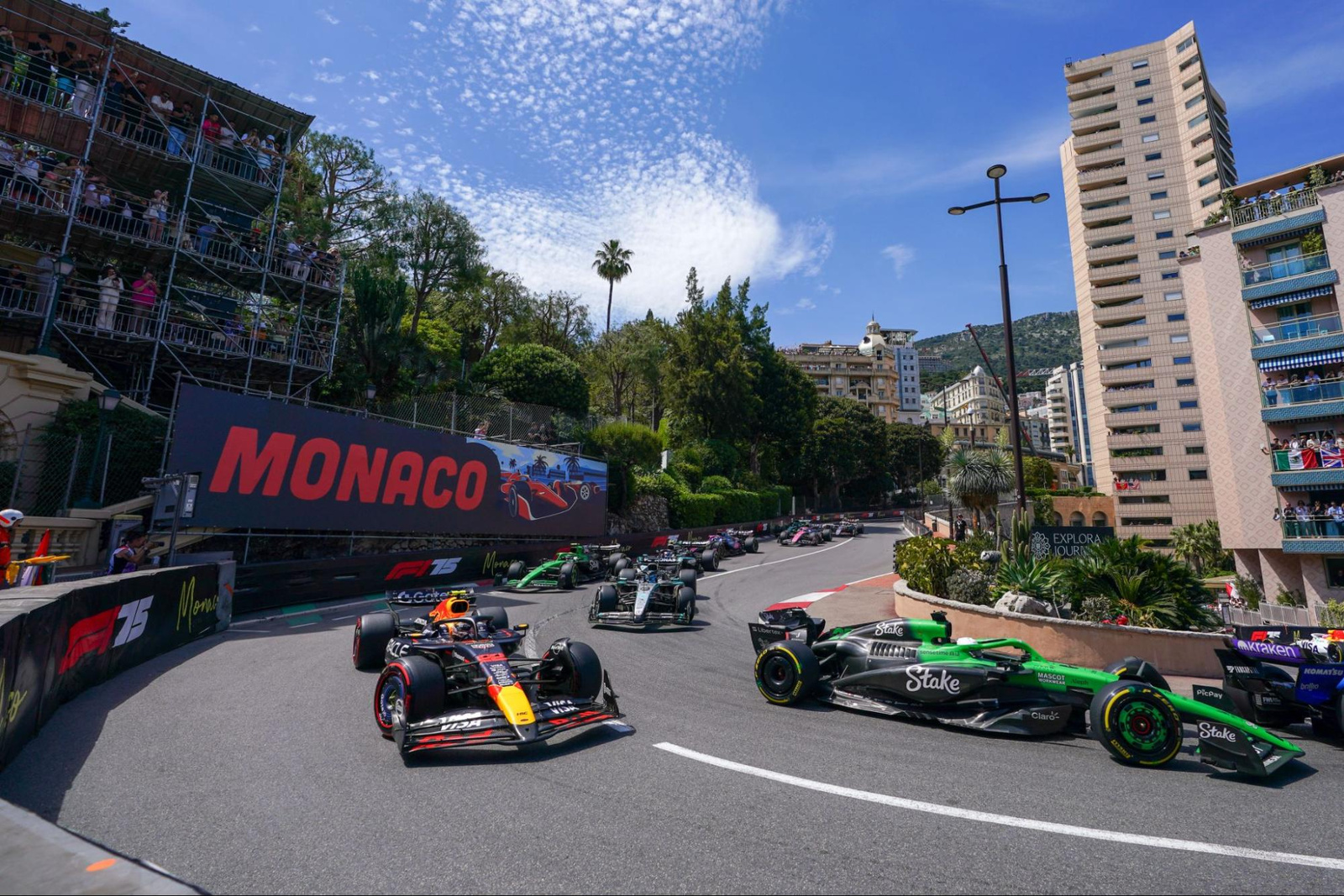 Formula 1 cars racing through the streets of the Monaco circuit