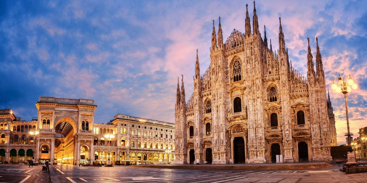 Milan Duomo skyline with luxury chauffeur car