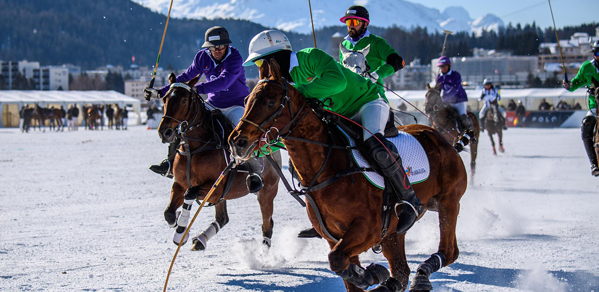 Snow polo match on frozen lake of St. Moritz