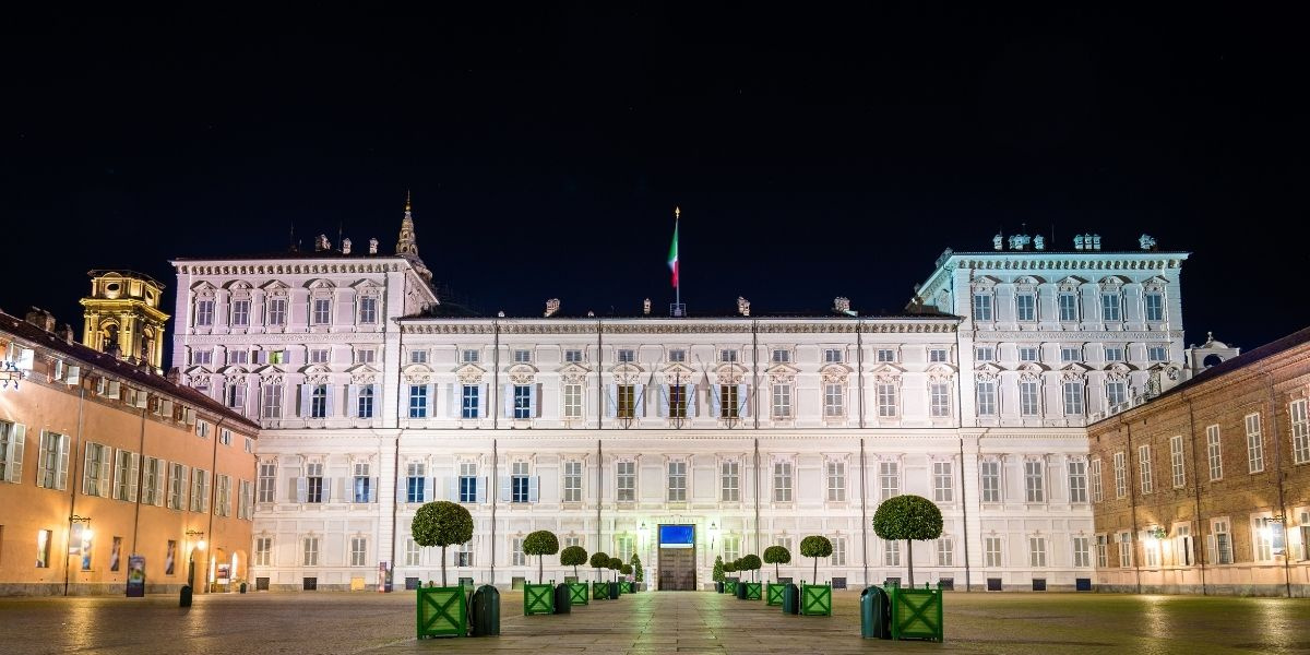 Turin Caselle airport terminal with chauffeur waiting