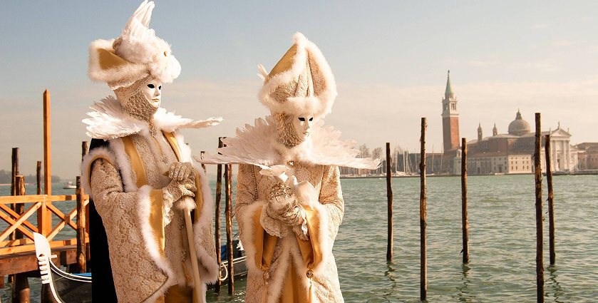 Venice Carnival masks and costumes in St Mark's Square